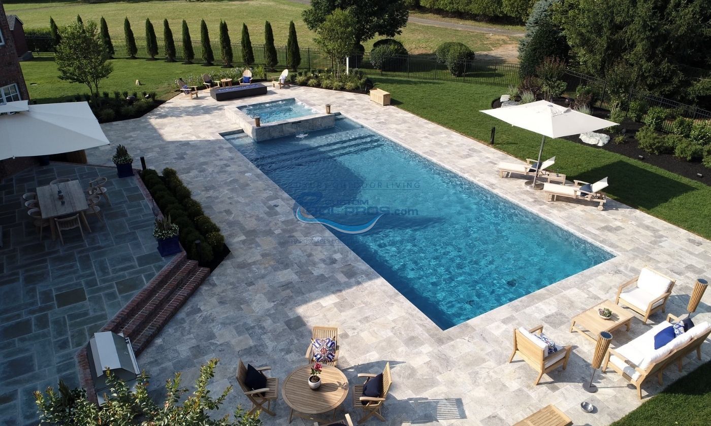 Backyard Swimming Pool with Wooden Decking in Watchung